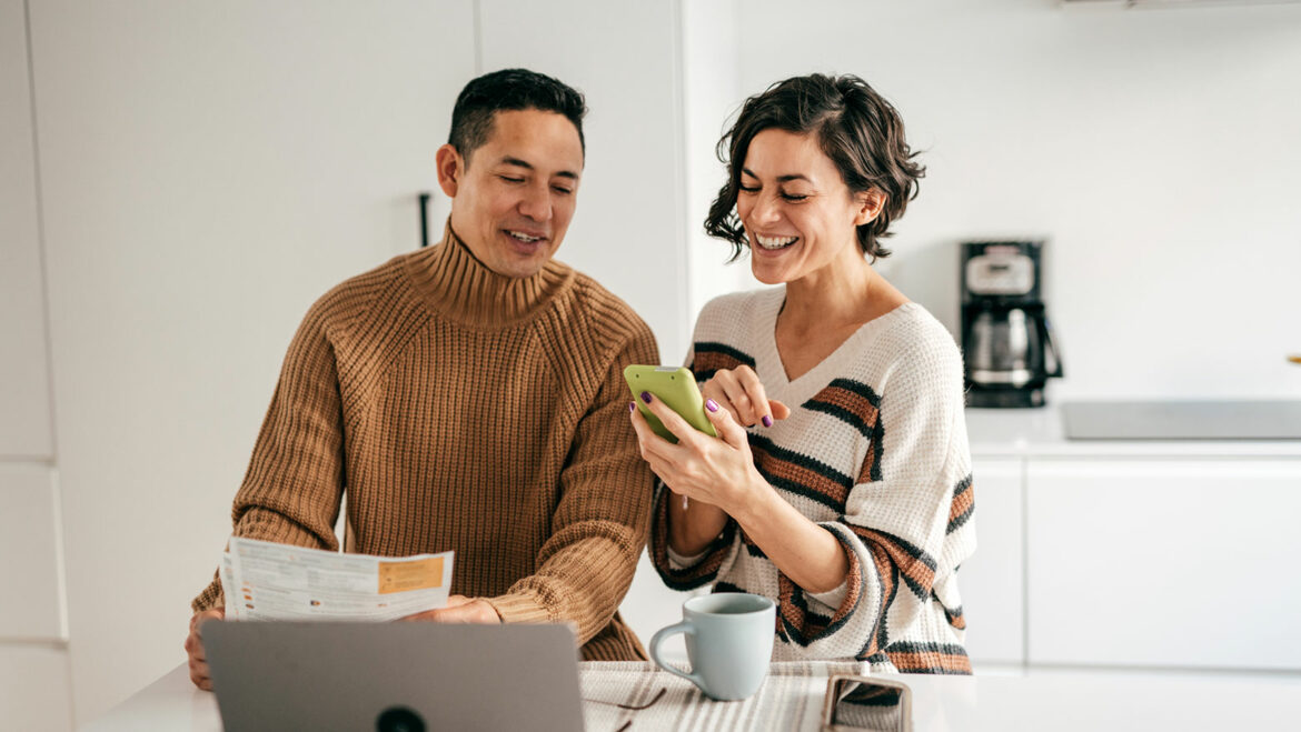 couple working on together on their wedding registry